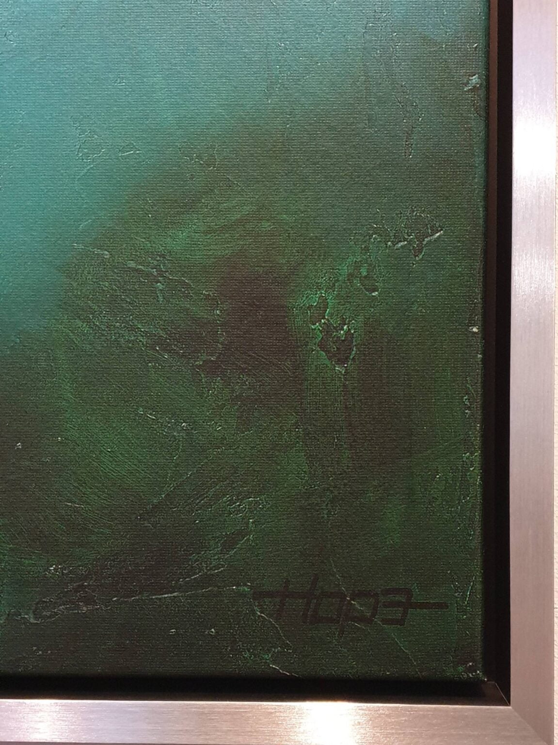 een abstract schilderij met groene en zwarte kleuren