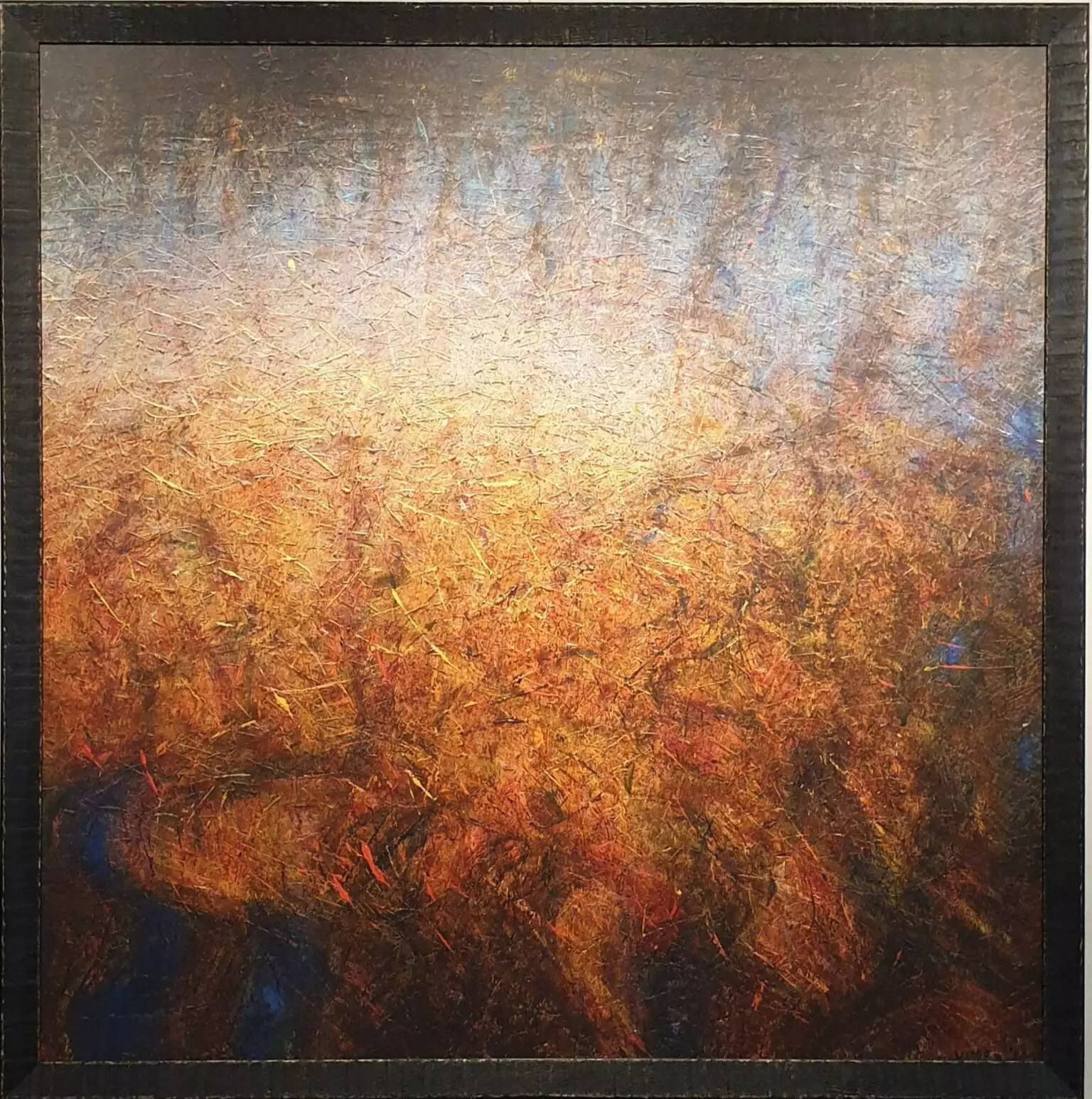 een abstract schilderij met bruine en gele kleuren