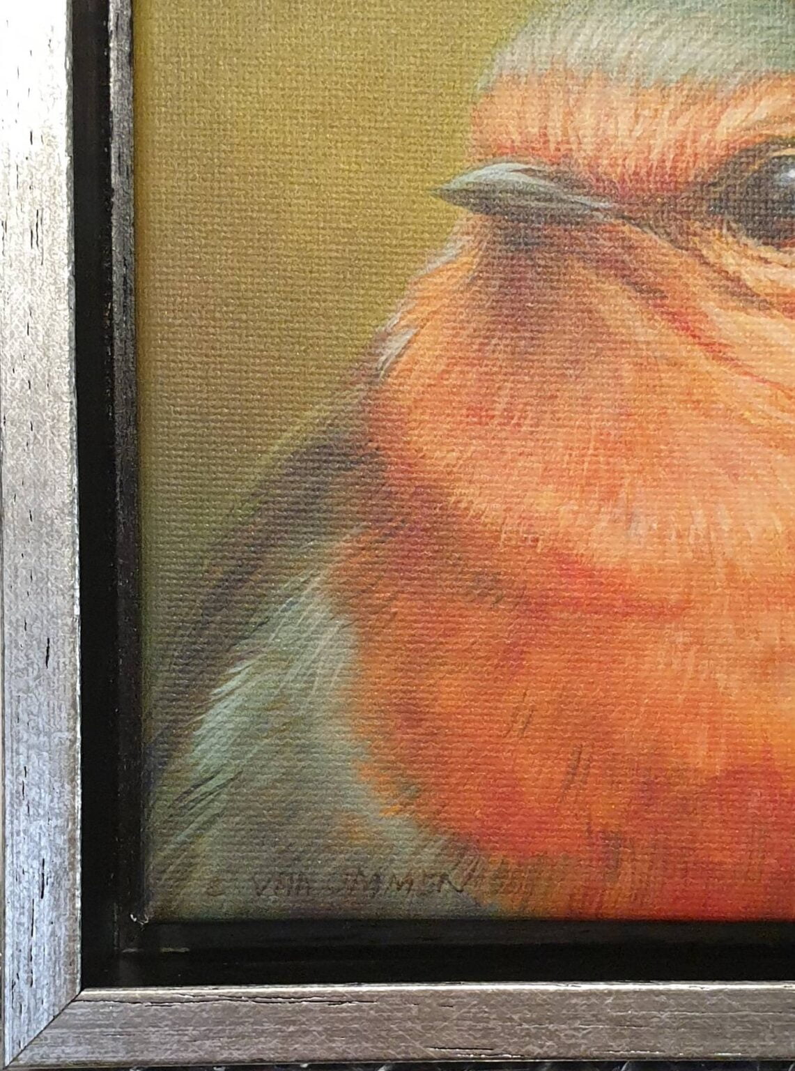 in een lijst is een schilderij van een vogel afgebeeld